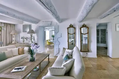 a living room with a couch and a table at Villa Sunset in Gordes in Gordes