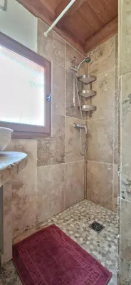 a bathroom with a shower with a sink and a shower at Escapades en Ventoux in Venasque