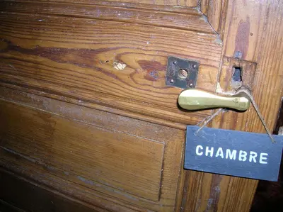 a wooden door with a sign that says charma at Le Mas des Baux in Bédoin