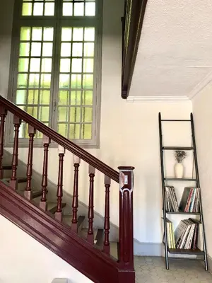 a staircase in a house with a window at B&B Villa Roumanille in Aix-en-Provence