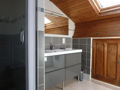 a kitchen with a sink and a shower at Les Cigales in Saint-Andiol