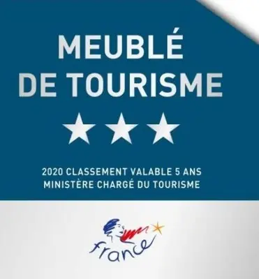 a sign that says neville de tourism with stars at Un Coin De Luberon in LʼIsle-sur-la-Sorgue