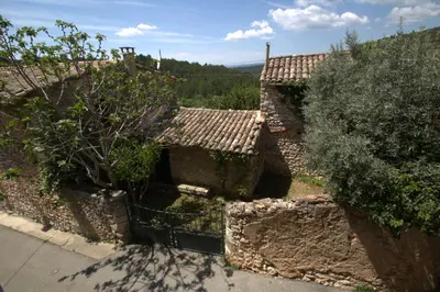 an overhead view of an old building with a roof at Luxurious Provencal Village House, Walk to Village Pool in Rustrel