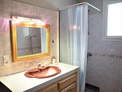 a bathroom with a sink and a shower at Ménerbes Home with Private Pool in Ménerbes