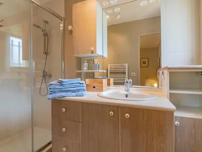 a bathroom with a sink and a shower at Holiday Home Les Iris by Interhome in Gargas