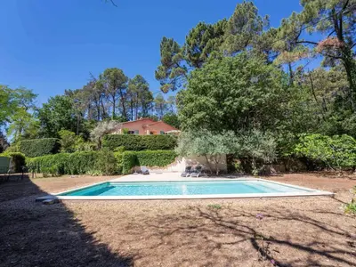 a swimming pool in the yard of a house at Holiday Home Les Ecureuils by Interhome in Saint-Pantaléon