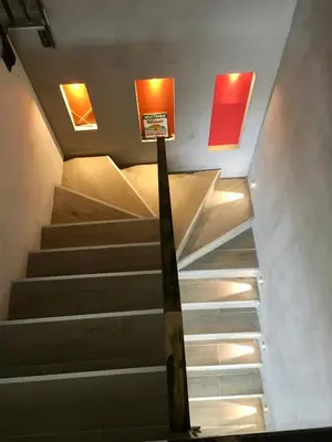 a set of stairs with a sign in the middle at Villa en campagne avec piscine et jacuzzi in Aix-en-Provence