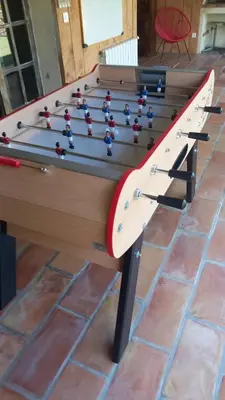 a pool table with eight balls on it at Villa - La quiétude de St Antoine - piscine privée in LʼIsle-sur-la-Sorgue