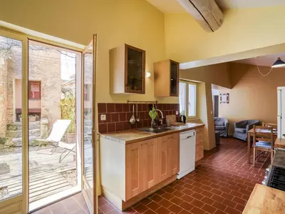 a kitchen with a sink and a counter at Holiday Home Les Huppes by Interhome in Saint-Saturnin-les-Apt