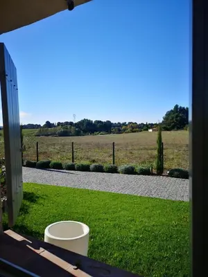 a view of a field from the porch of a house at maison Moliere in Aix-en-Provence