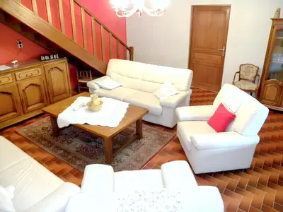 a living room with two white chairs and a table at Villa spacieuse à Lioux avec piscine privée et vue montagne in Lioux