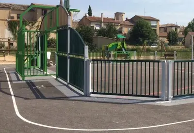 a batting cage at a park with a playground at Le calme et la tranquilité à 15 minutes d'Avignon in Caumont-sur-Durance