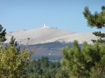 a mountain with a cross on top of it at Le Jas de Verdolier in Sault-de-Vaucluse