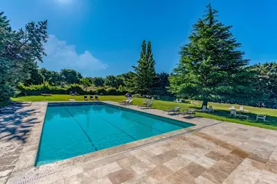 an image of a swimming pool in a yard at Best Western Domaine de Roquerousse in Salon-de-Provence