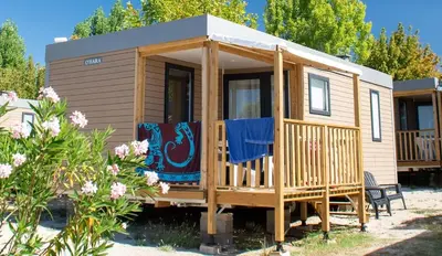 a bathroom with a sink and a shower at Camping Les Hautes Prairies in Lourmarin