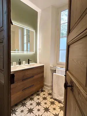 a bathroom with a sink and a mirror at Château de Saint-Girons - Luxury Guest House in Provence in Aix-en-Provence