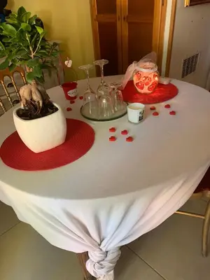 a table with a white table cloth with a skull on it at DEPENDANCE PRIVEE - HALTE ROUTE in Le Thor