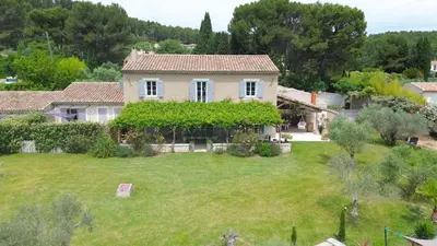 an aerial view of a house with a yard at Mas Carla in Noves