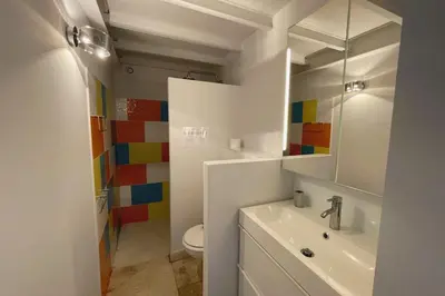 a bathroom with a sink and a mirror at Mas de Panière - Saint Remy de Provence in Paluds de Noves