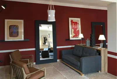 a hotel room with two beds and a window at La Maison des Ocres - Provence in Roussillon