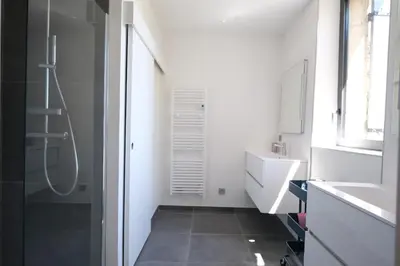 a bathroom with a shower and a sink at provencal farm house with heated pool located to salon de provence, 12 people in Salon-de-Provence