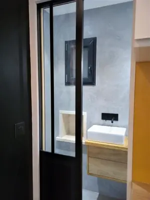a bathroom with a white sink and a mirror at Le Petit Studio - 15 m2 - Centre Ville - Sorgue à 50 m in LʼIsle-sur-la-Sorgue