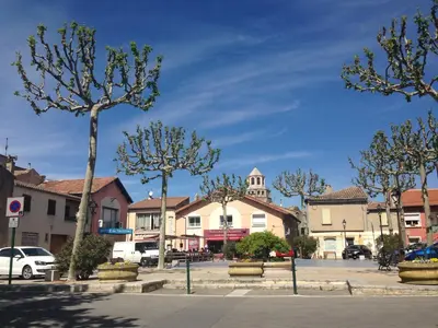 a town with trees in a parking lot at The Willow Tree in Le Thor