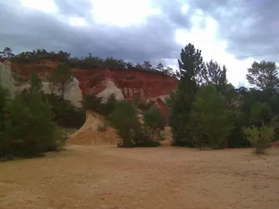 a view of a rock formation in a field at La Fontaine in Simiane-la-Rotonde