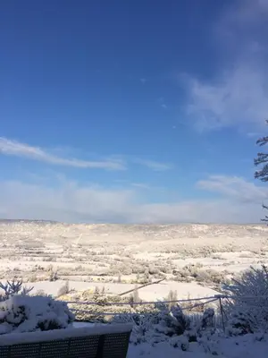 a view of a snowy field with snow on the ground at LA MAISON D’ALICE in Sault-de-Vaucluse