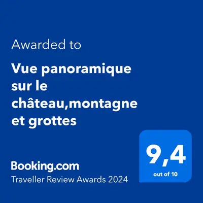 a screenshot of a cell phone with the text awarded to we panamciplinary cure at Vue panoramique sur le château,montagne et grottes in Fontaine-de-Vaucluse