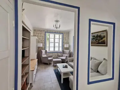 a living room with a couch and a table at Mas de Férigoulet -