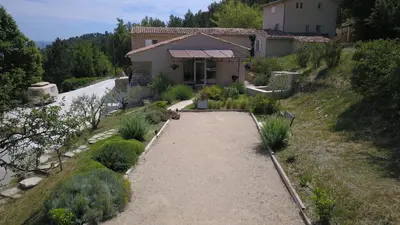 an aerial view of a house with a driveway at Mas des Genêts in Manosque