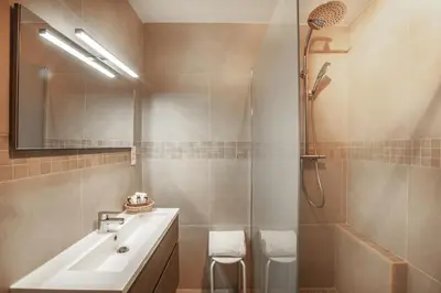 a bathroom with a sink and a shower at Chez Suzanne in Bonnieux