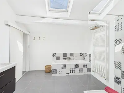 a white bathroom with a sink and a tub at Magnifique Mas Provençal avec Piscine à Eygalières - 19 Couchages, 8 Chambres, Billard, et Plus ! - FR-1-599-3 in Eygalières