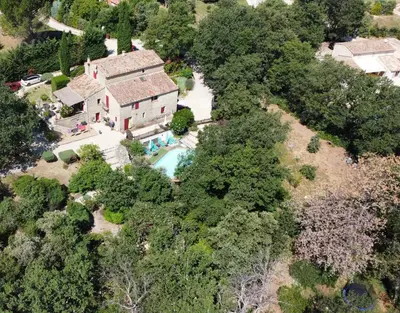 a sign on a rock that reads god whistle be dancing at La bastide de Mauragne - Gîte les Iris in Apt