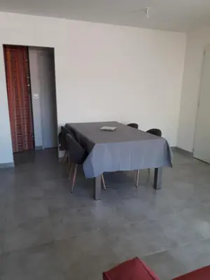 a meeting room with a table and chairs in it at Villa au pied du Ventoux in Mormoiron