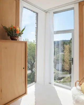 a room with a large window with a view at Les Milles Roches in Gordes