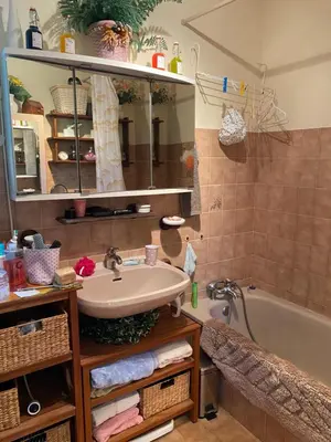a bathroom with a sink and a bath tub at Maison provençale en campagne à Eguilles in Éguilles