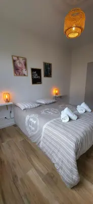 a bedroom with two beds with towels on them at Villa la Provence, Luxe, Confort et Joie de Vivre in Carpentras