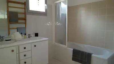a bathroom with a sink and a tub and a shower at Provence Luberon Goult Gite Mafasuza in Goult