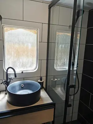 a bathroom with a sink and a shower at Interlude in Lambesc