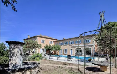 a large house with a swimming pool in front of it at 7 Bedroom Nice Home In Apt in Apt