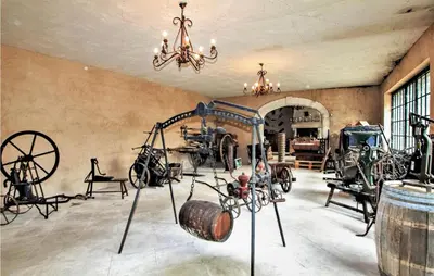 a room filled with lots of antique items on display at 2 Bedroom Amazing Home In Apt in Apt