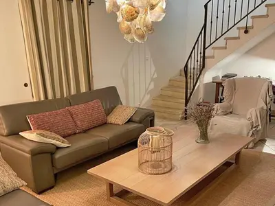 a living room with a couch and a coffee table at Grands Abayers in Apt
