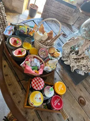 a tray of food on top of a table at Mas de la Butte Blanche in Orgon