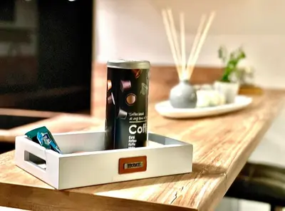 a can of coke sitting on top of a table at *FONTAINE MOUSSUE*HYPER CENTRE*T2 STANDING* in Salon-de-Provence