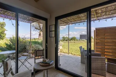 a room with sliding glass doors and a patio at Terre Luberon in Pertuis
