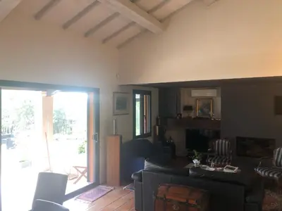 a living room with a couch and a table at les Bartavelles in Roussillon