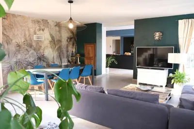a living room with a couch and a table at villa with pool and beautiful view in the luberon in pujet sur durance - 10 in Puget