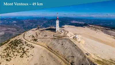 an aerial view of a mountain with a tower on top at Les Bastidons de l'Isle - Le Seguret - 3 étoiles in LʼIsle-sur-la-Sorgue